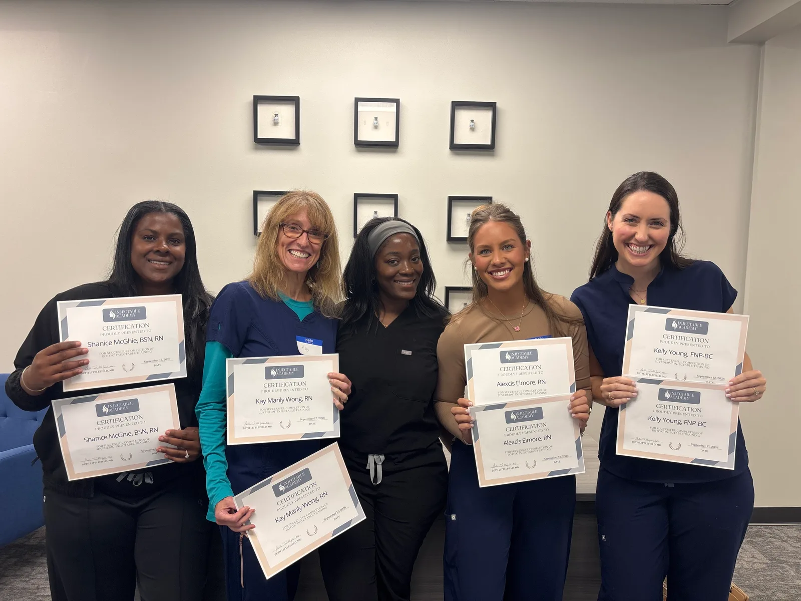 Atlanta students displaying their Academy certificates