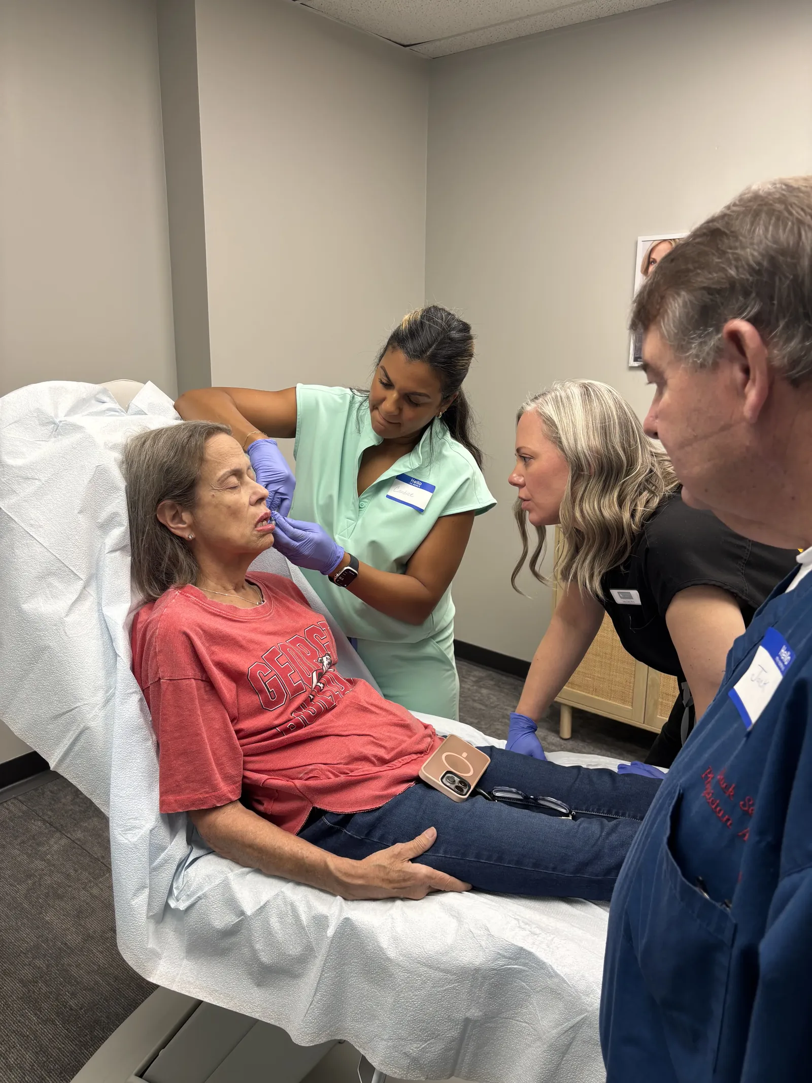 A student practices with a model and nearby instructors in Savannah