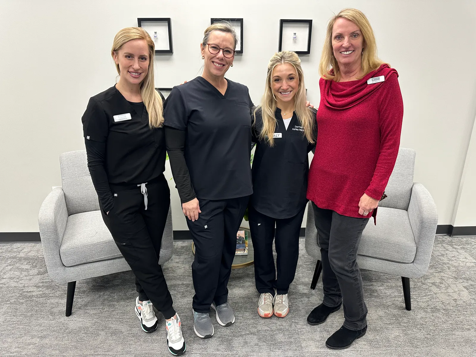 Four participants and instructors stand together after a NEXT STEP training session in Atlanta